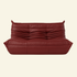 Dark Red leather 2-seater dupe on a beige background