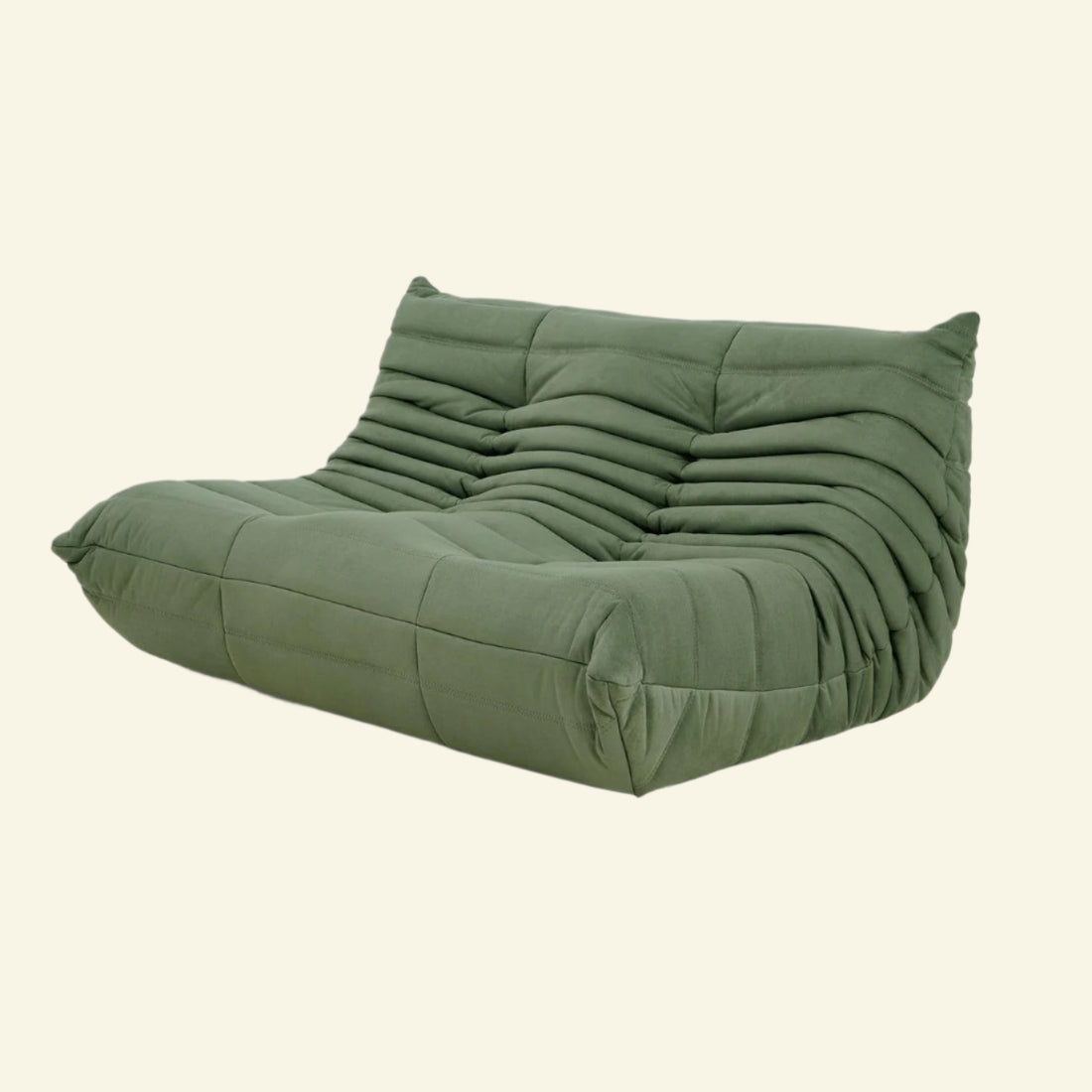 Matcha-green dupe of the velvet Togo-style 2-seater sofa  – low, frameless design with plush channel tufting