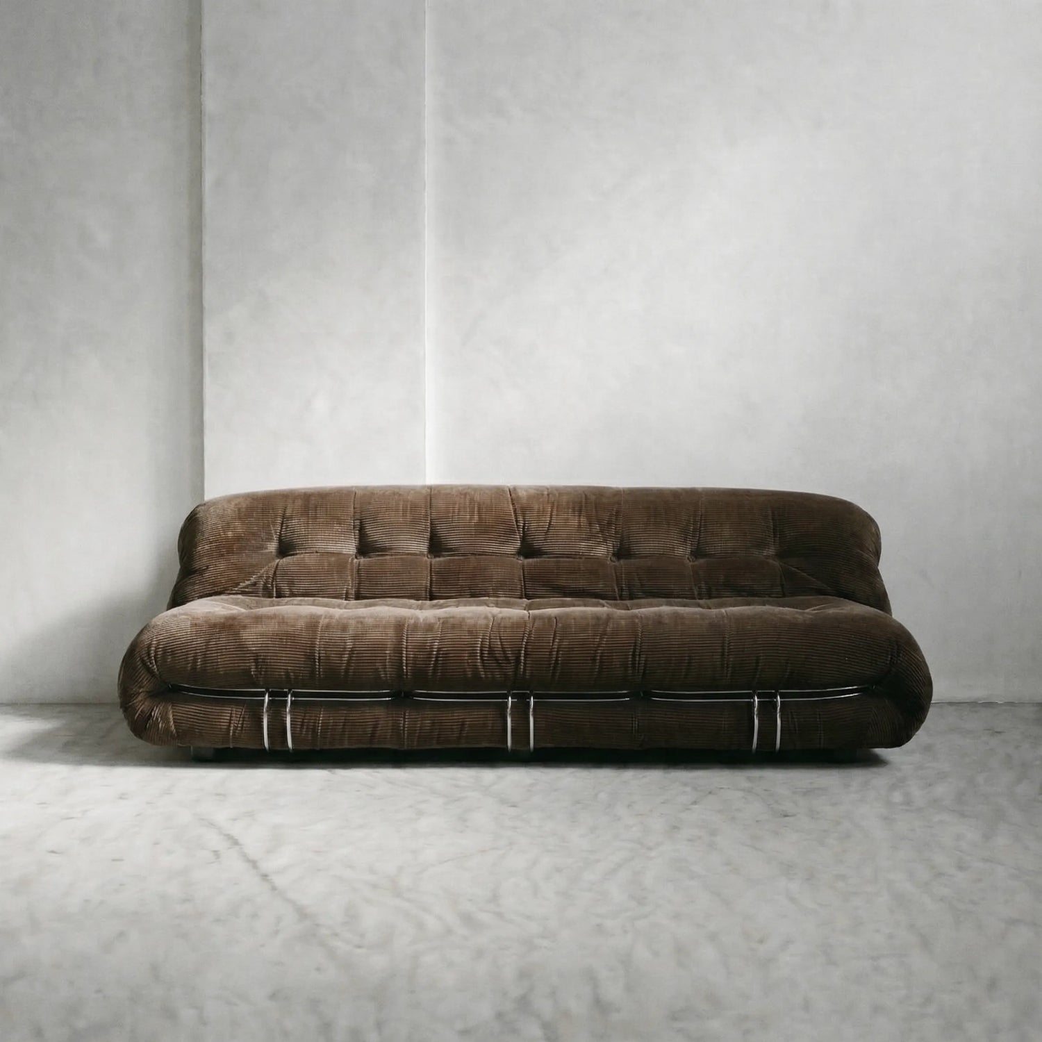 soriana sofa 3-seater dupe in brown corduroy on gray floor with white wall background