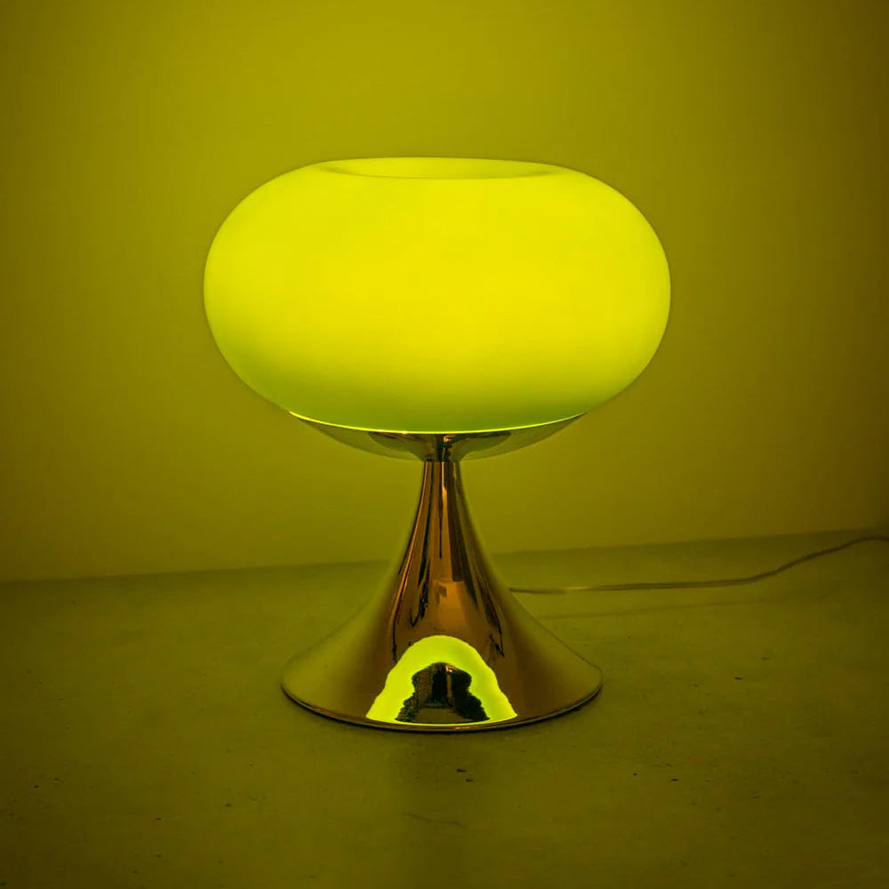 Modern lollipop lamp space age design with rounded glass shade and chrome base.