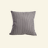 Striped  corduroy pillow on a beige background