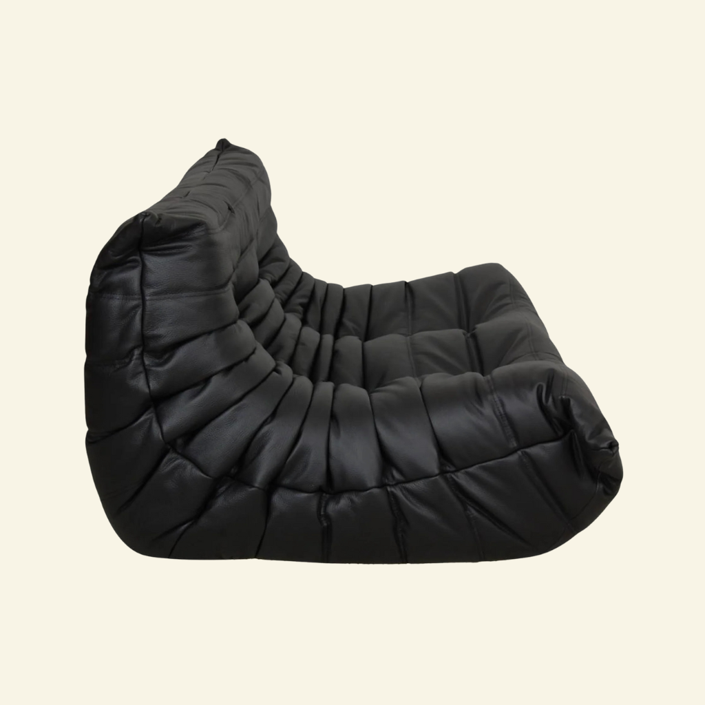 Side view of Togo 3-seater sofa replica in black leather, armless low-profile lounge design – Vibehaus.