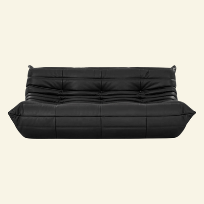 Togo-inspired 3-seater sofa replica in black leather, full front view with deep seat and pleated folds – Vibehaus