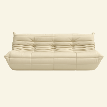 Togo-inspired 3-seater sofa replica in cream leather, full front view with deep seat and pleated folds – Vibehaus.