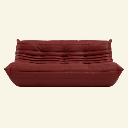 Togo-inspired 3-seater sofa replica in red leather, full front view with deep seat and pleated folds – Vibehaus.