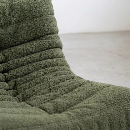 Handmade caterpillar sofa chair as dupe in boucle green – plush high-density sponge filling for ergonomic comfort