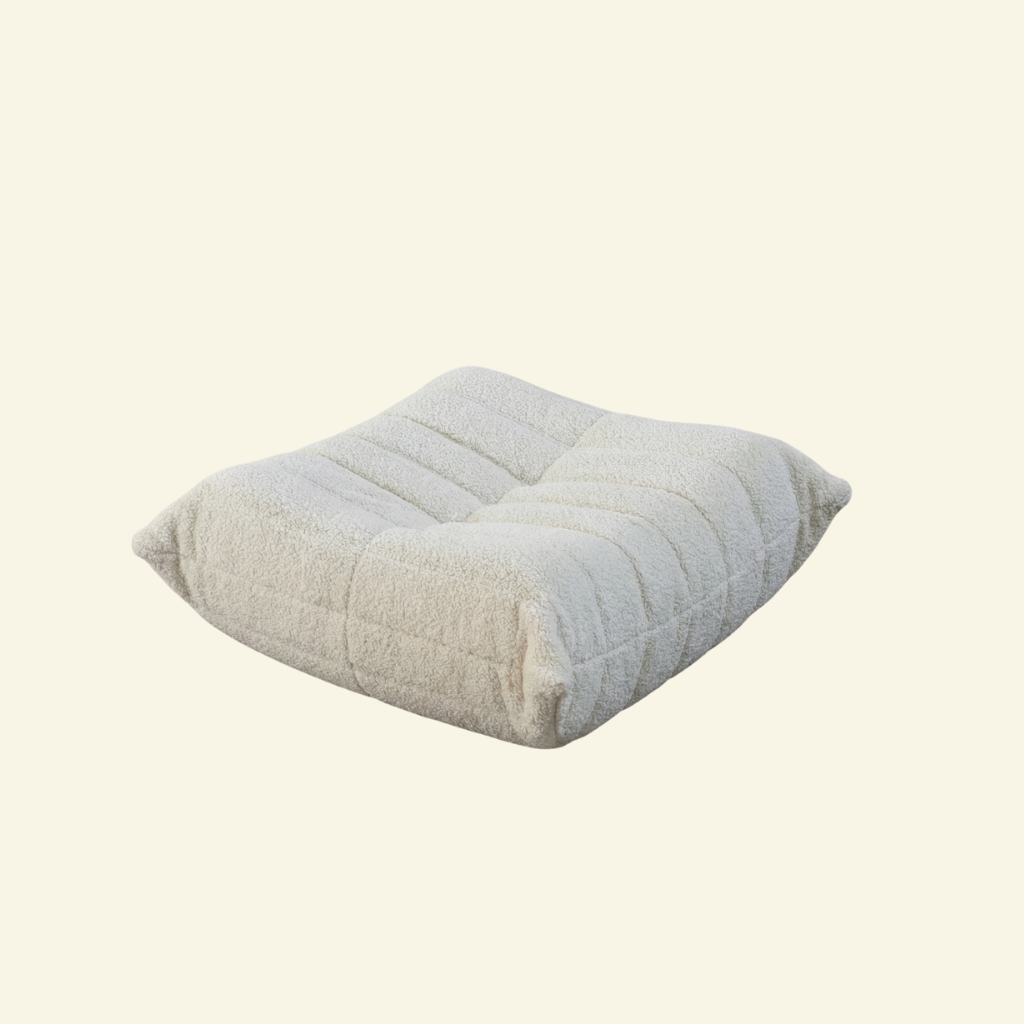 Togo Ottoman Dupe in white Bouclé on beige background