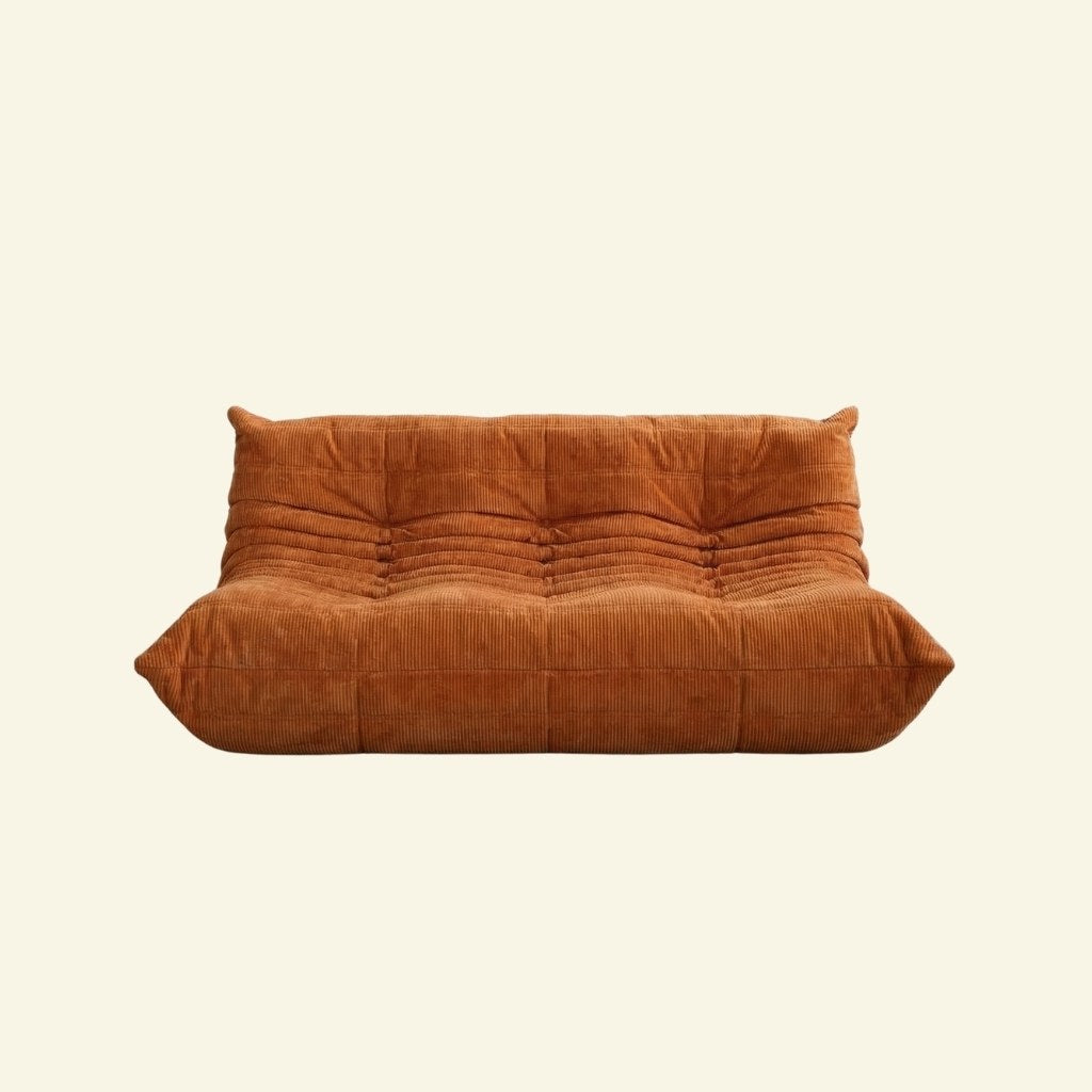 Togo sofa 3-seater dupe in orange corduroy by vibehaus on beige background 