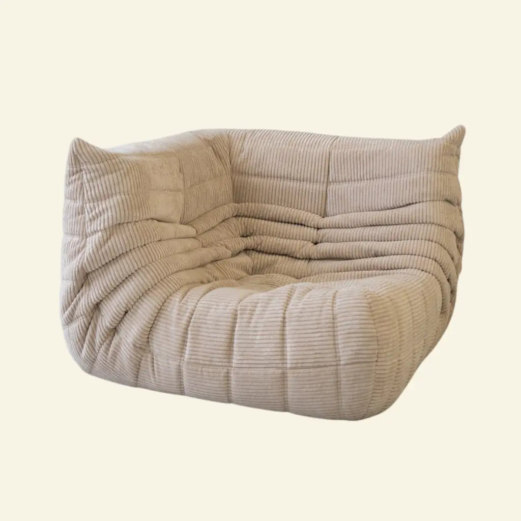Beige Replica of the togo corner module in corduroy on a beige background