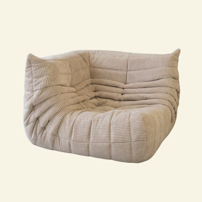 Beige Replica of the togo corner module in corduroy on a beige background