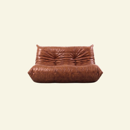 Brown togo sofa dupe in leather on beige background